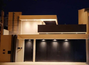Suíte Aconchegante e Garagem Grátis - Até 4 Pessoas